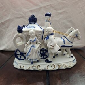 Porcelain Carriage Figurine with Blue Accents